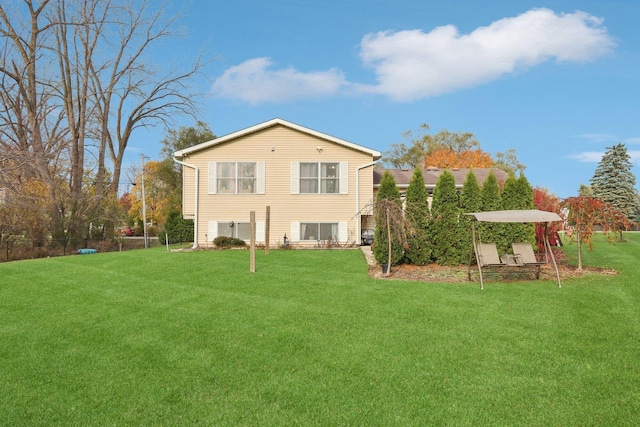9997 W Paddock Ave, Beach Park, IL 60087 - rear view of property featuring a lawn