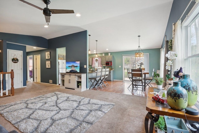 9997 W Paddock Ave, Beach Park, IL 60087 - living room featuring light colored carpet, a ceiling fan, vaulted ceiling, and recessed lighting