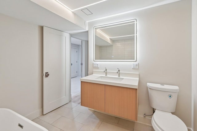 7930 S Kenwood Ave, Chicago, IL 60619 - bathroom with vanity and tile patterned flooring