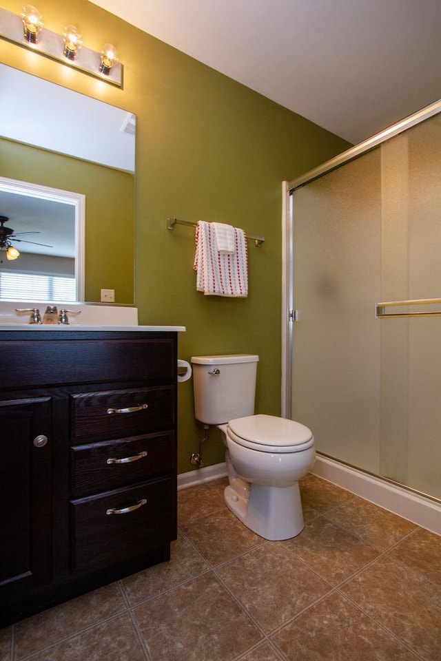 1670 Windward Dr, Pingree Grove, IL 60140 - bathroom with vanity, a stall shower, tile patterned floors, and a ceiling fan