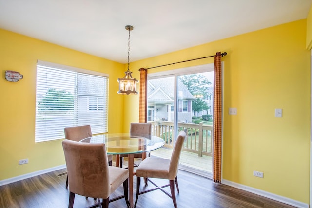 1670 Windward Dr, Pingree Grove, IL 60140 - dining room featuring a chandelier and dark wood-type flooring