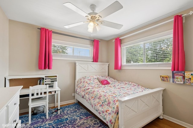 1308 Hoffman Ave, Park Ridge, IL 60068 - bedroom featuring multiple windows, wood finished floors, and ceiling fan