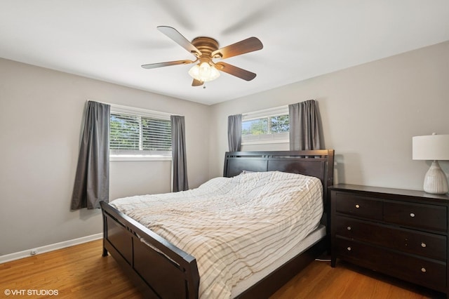 1308 Hoffman Ave, Park Ridge, IL 60068 - bedroom with multiple windows, wood finished floors, and ceiling fan