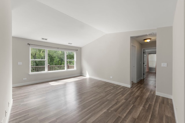 992 Langtry Ct Unit D, Elgin, IL 60120 - spare room with vaulted ceiling and dark wood-style floors