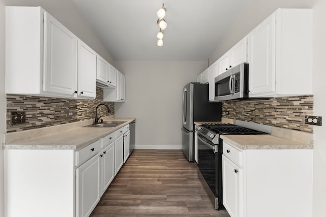 992 Langtry Ct Unit D, Elgin, IL 60120 - kitchen featuring stainless steel appliances, white cabinetry, wood finished floors, backsplash, and light countertops