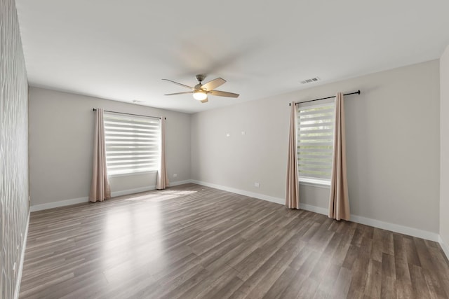 992 Langtry Ct Unit D, Elgin, IL 60120 - spare room featuring ceiling fan and wood finished floors