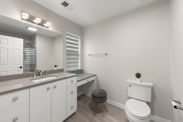 992 Langtry Ct Unit D, Elgin, IL 60120 - bathroom with vanity, a shower, and wood finished floors