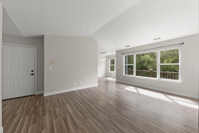 992 Langtry Ct Unit D, Elgin, IL 60120 - unfurnished living room with wood finished floors and vaulted ceiling