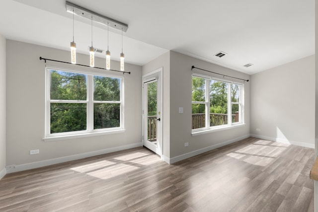 992 Langtry Ct Unit D, Elgin, IL 60120 - unfurnished dining area featuring wood finished floors