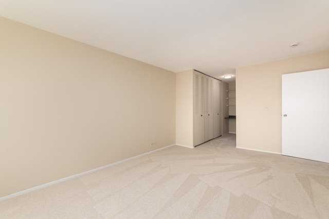 1110 Grove St Unit 4A, Downers Grove, IL 60515 - unfurnished bedroom featuring light carpet and a closet