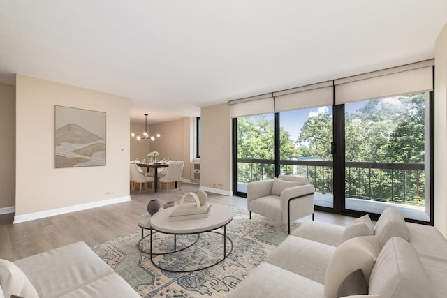 1110 Grove St Unit 4A, Downers Grove, IL 60515 - living area featuring wood finished floors and a chandelier