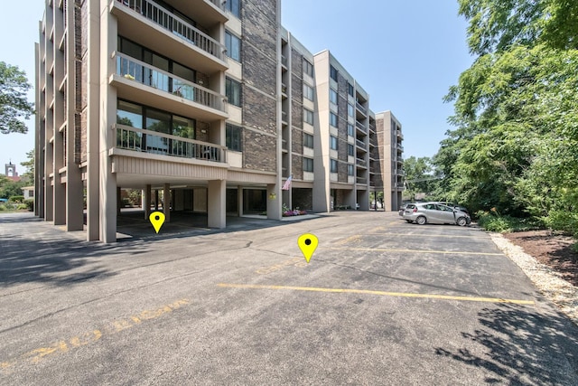 1110 Grove St Unit 4A, Downers Grove, IL 60515 - view of apartment building / complex featuring uncovered parking
