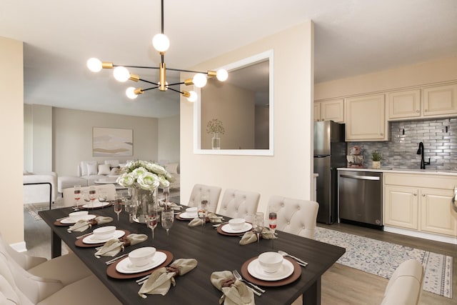 1110 Grove St Unit 4A, Downers Grove, IL 60515 - dining area with light wood finished floors and a chandelier