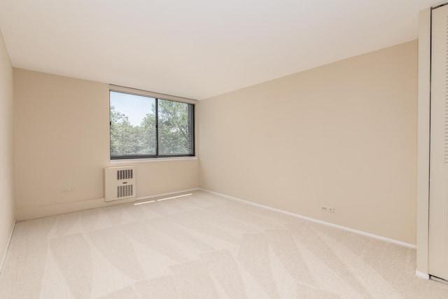 1110 Grove St Unit 4A, Downers Grove, IL 60515 - spare room with light carpet and heating unit