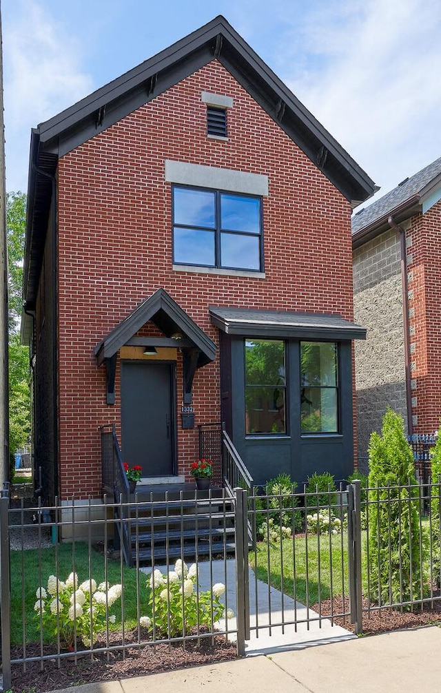 1332 N Leavitt St, Chicago, IL 60622 - contemporary home featuring a fenced front yard and brick siding