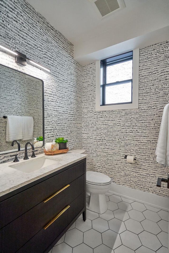 1332 N Leavitt St, Chicago, IL 60622 - bathroom with vanity, tile patterned flooring, and tile walls