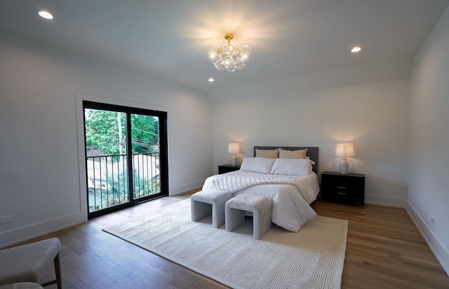 1332 N Leavitt St, Chicago, IL 60622 - bedroom featuring access to exterior, wood finished floors, a chandelier, and recessed lighting