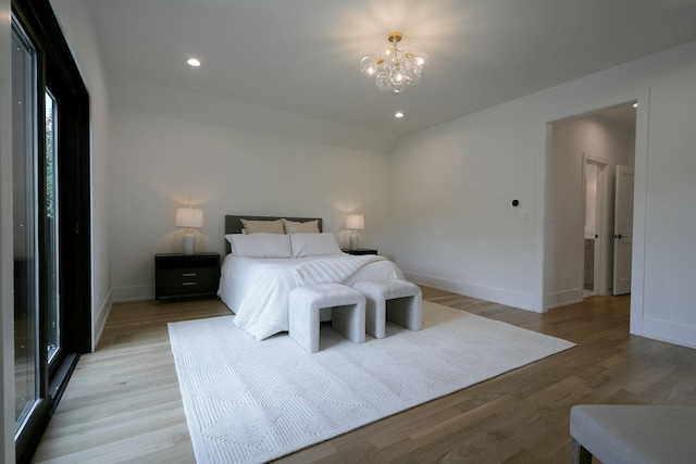 1332 N Leavitt St, Chicago, IL 60622 - bedroom with a chandelier, light wood finished floors, and recessed lighting