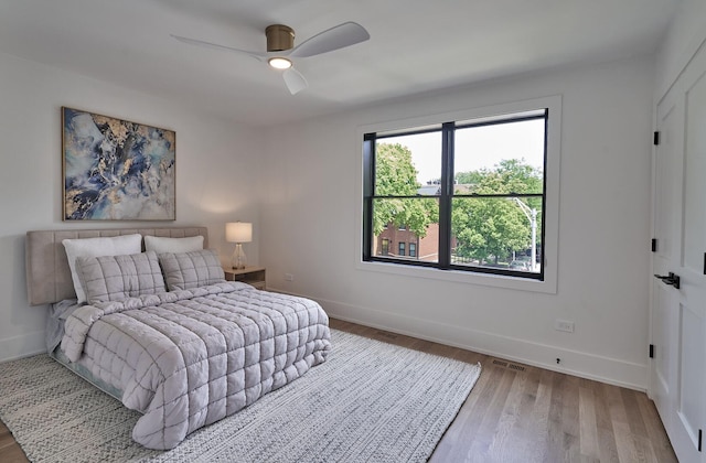 1332 N Leavitt St, Chicago, IL 60622 - bedroom featuring wood finished floors and ceiling fan
