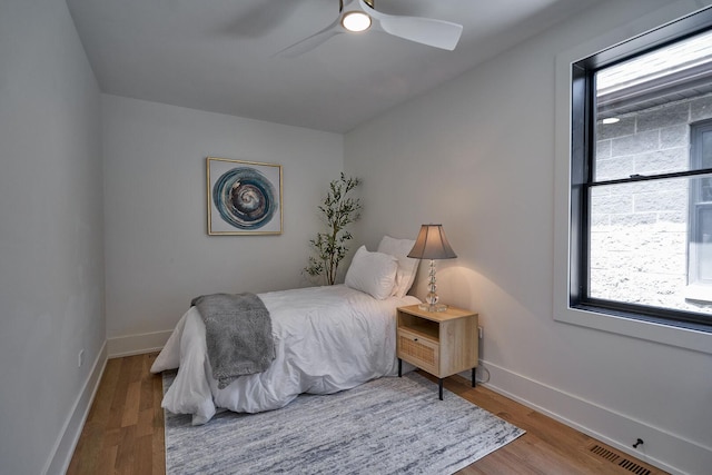 1332 N Leavitt St, Chicago, IL 60622 - bedroom with wood finished floors and a ceiling fan