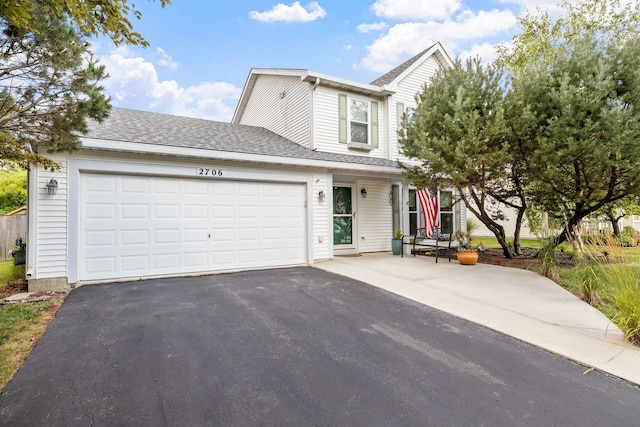 2706 Steamboat Cir, Plainfield, IL 60586 - traditional-style home featuring driveway, a garage, and roof with shingles