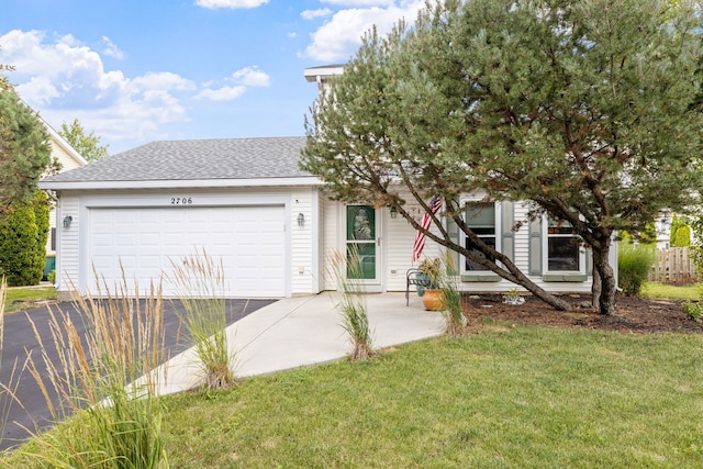 2706 Steamboat Cir, Plainfield, IL 60586 - view of front of property featuring a front lawn, an attached garage, a shingled roof, and driveway