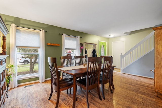 2706 Steamboat Cir, Plainfield, IL 60586 - dining space featuring wood finished floors and stairs