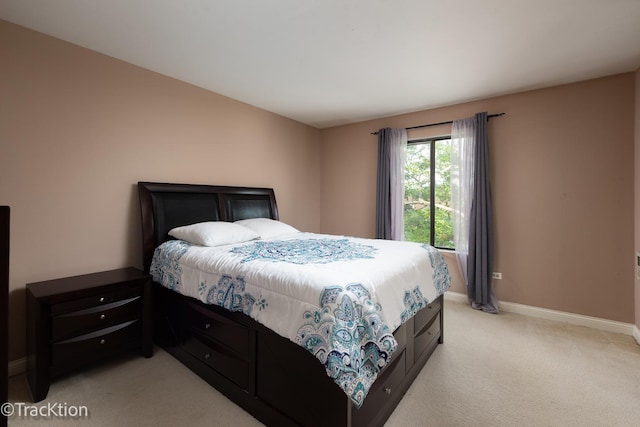 1091 Rodenburg Rd Unit 303, Roselle, IL 60172 - bedroom with light colored carpet and baseboards