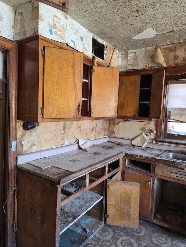 10511 S Yates Ave, Chicago, IL 60617 - kitchen with brown cabinetry