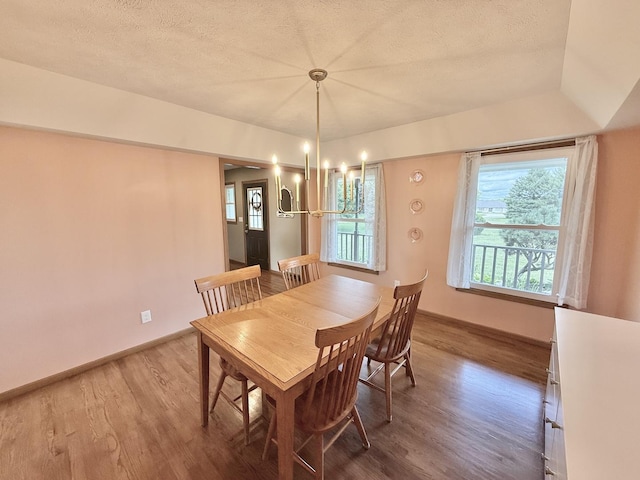 5448 S Branch Ct, Rochelle, IL 61068 - dining space with wood finished floors and a textured ceiling
