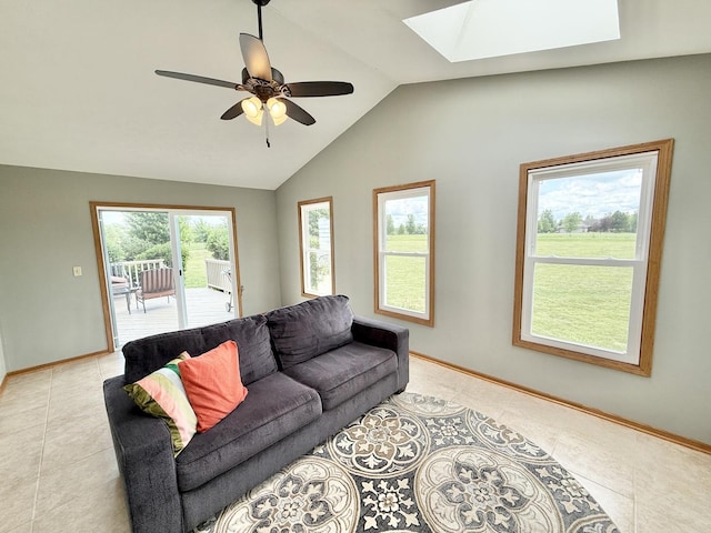 5448 S Branch Ct, Rochelle, IL 61068 - living room with a skylight, light tile patterned flooring, lofted ceiling, and a ceiling fan