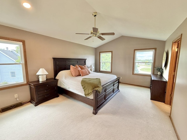 5448 S Branch Ct, Rochelle, IL 61068 - bedroom with vaulted ceiling, light colored carpet, and ceiling fan