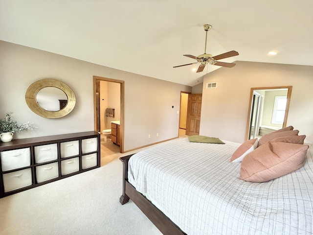 5448 S Branch Ct, Rochelle, IL 61068 - bedroom featuring lofted ceiling, ensuite bath, and light carpet