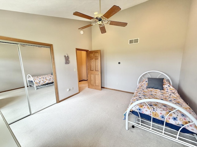 5448 S Branch Ct, Rochelle, IL 61068 - bedroom featuring light carpet, a closet, high vaulted ceiling, and a ceiling fan