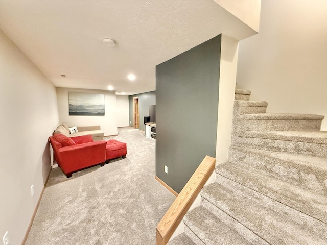 5448 S Branch Ct, Rochelle, IL 61068 - carpeted living area with stairs and baseboards
