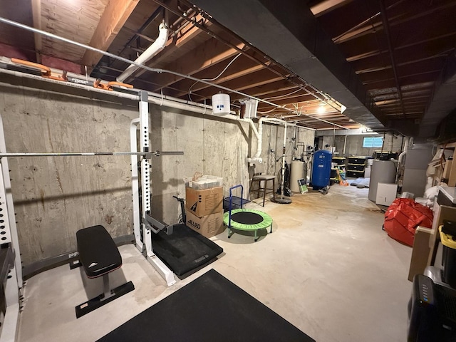 5448 S Branch Ct, Rochelle, IL 61068 - unfinished below grade area featuring a water pressure tank and water heater