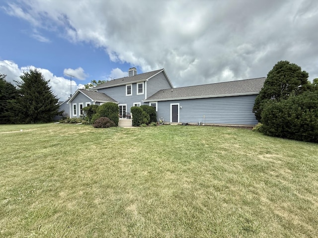 5448 S Branch Ct, Rochelle, IL 61068 - view of front of house featuring a front lawn