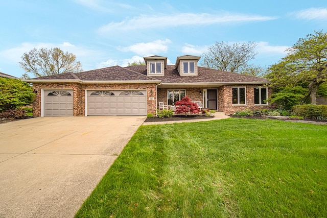 207 Hamilton Ave, Frankfort, IL 60423 - view of front of home with driveway, a garage, a front lawn, brick siding, and a shingled roof