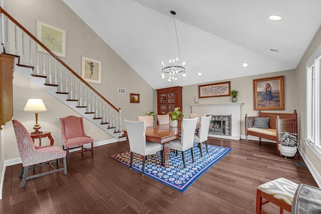 207 Hamilton Ave, Frankfort, IL 60423 - dining area with wood finished floors, recessed lighting, stairs, a chandelier, and high vaulted ceiling