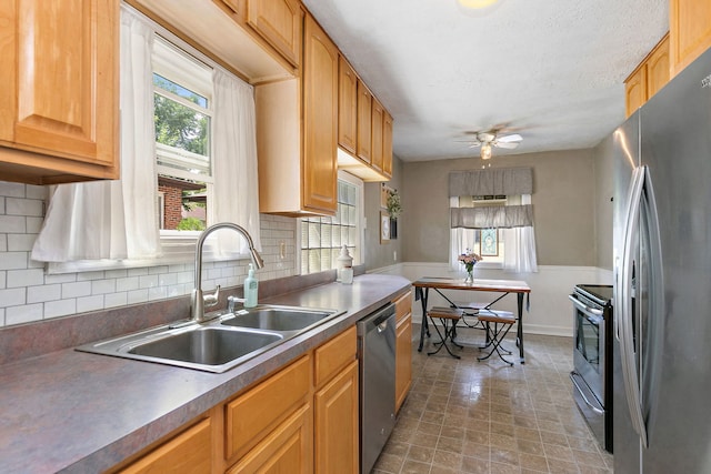 911 N 9th St, Dekalb, IL 60115 - kitchen featuring stainless steel appliances, plenty of natural light, and decorative backsplash
