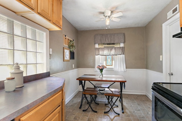911 N 9th St, Dekalb, IL 60115 - dining space featuring a ceiling fan