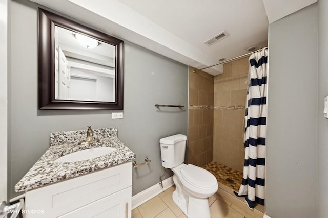 4229 S Prairie Ave, Chicago, IL 60653 - bathroom with vanity, tiled shower, and tile patterned flooring