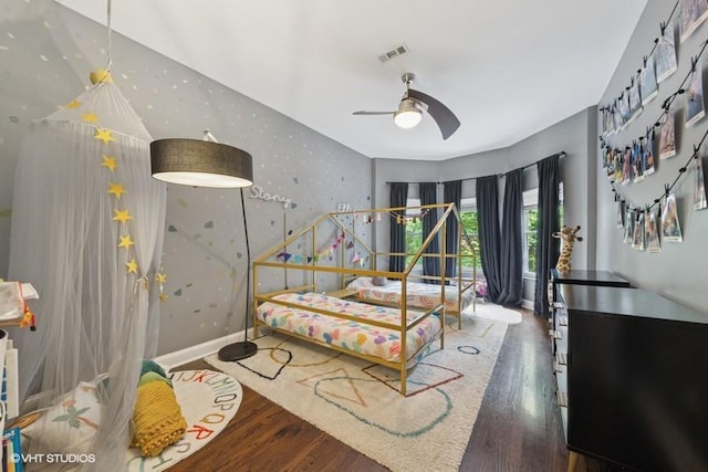 4229 S Prairie Ave, Chicago, IL 60653 - bedroom with wallpapered walls and wood finished floors