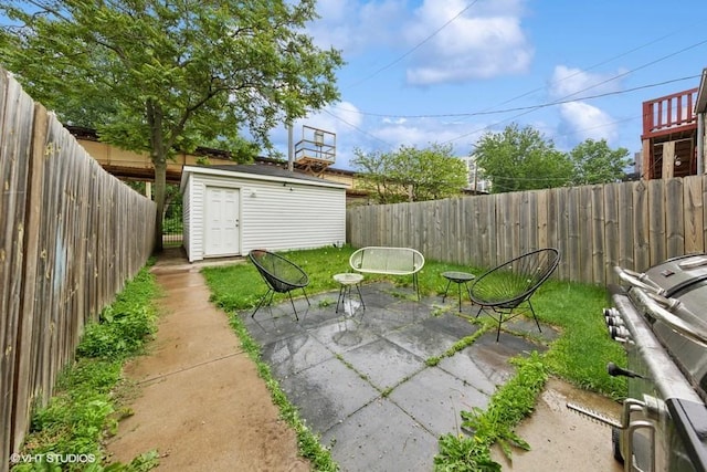 4229 S Prairie Ave, Chicago, IL 60653 - fenced backyard with a patio and a shed