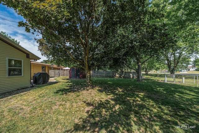 92 Neil Rd, Sugar Grove, IL 60554 - fenced backyard featuring a storage shed