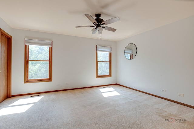 1021 Autumn Dr, Antioch, IL 60002 - carpeted empty room featuring healthy amount of natural light and a ceiling fan