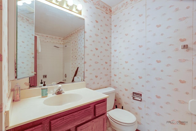 1021 Autumn Dr, Antioch, IL 60002 - bathroom featuring wallpapered walls, vanity, and a shower