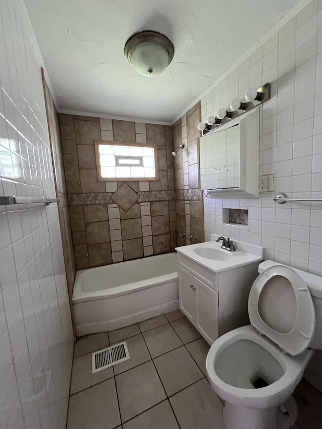 252 Mantua St, Park Forest, IL 60466 - full bathroom with tile walls, tile patterned flooring, vanity, tub / shower combination, and backsplash