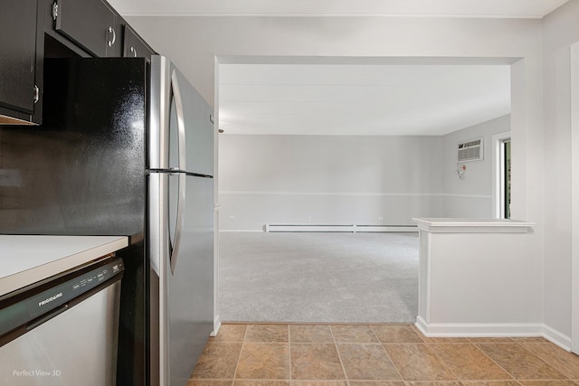 5340 Waterbury Ct Unit 2103, Crestwood, IL 60418 - kitchen featuring stainless steel appliances, light carpet, dark cabinetry, baseboard heating, and an AC wall unit