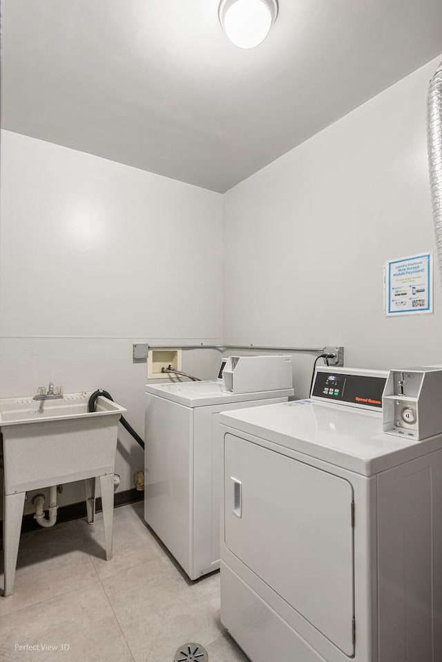 5340 Waterbury Ct Unit 2103, Crestwood, IL 60418 - shared laundry room featuring separate washer and dryer and light tile patterned flooring